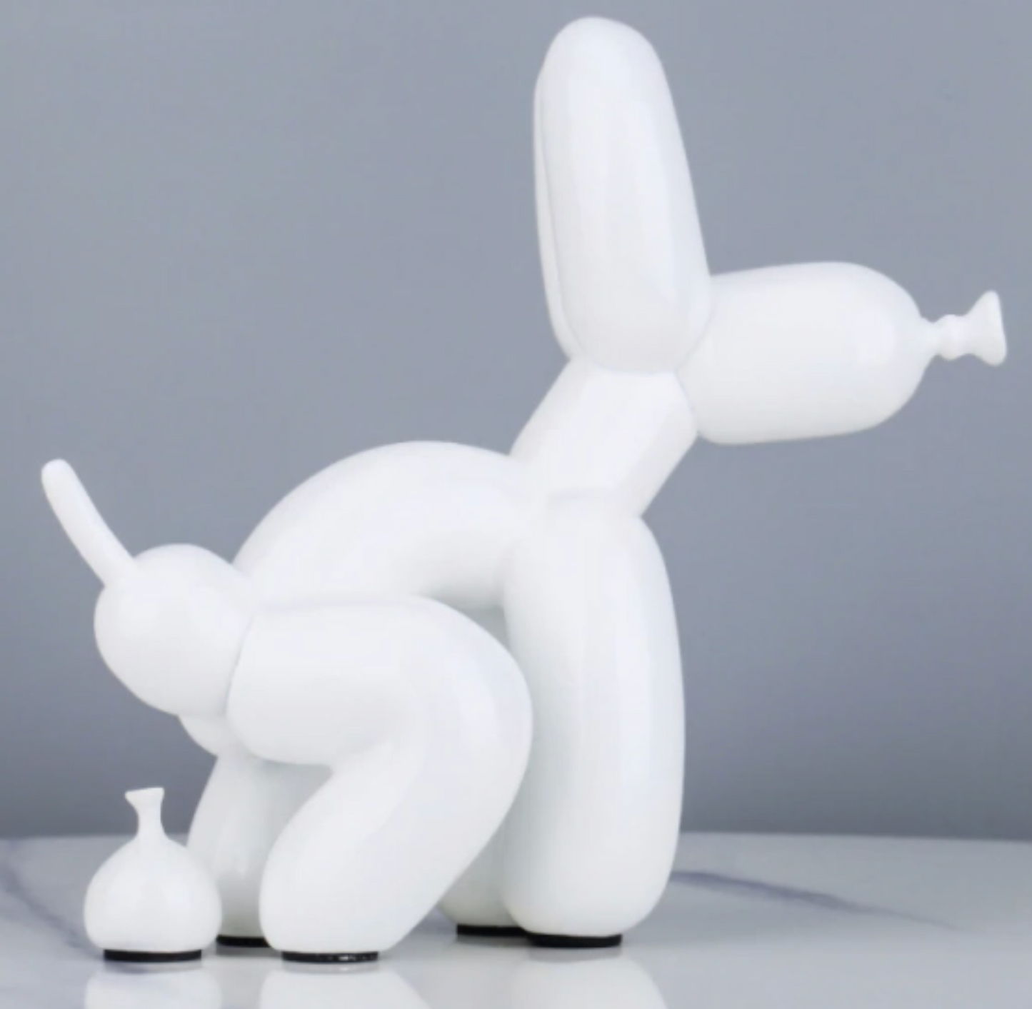 Balloon Dog Pooping Statue