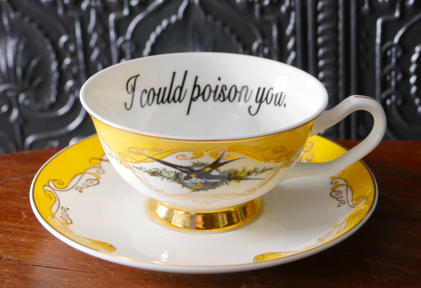 Yellow Bird Insult cup and saucer: I could poison you